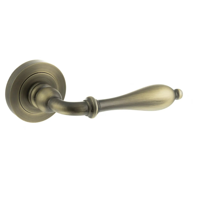Atlantic Old English Wrexham Lever Door Handle on Round Rose - Matt Antique Brass