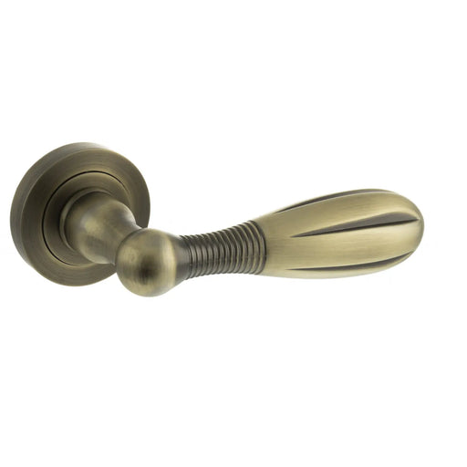 Atlantic Old English Cambridge Lever Door Handle on Round Rose - Matt Antique Brass