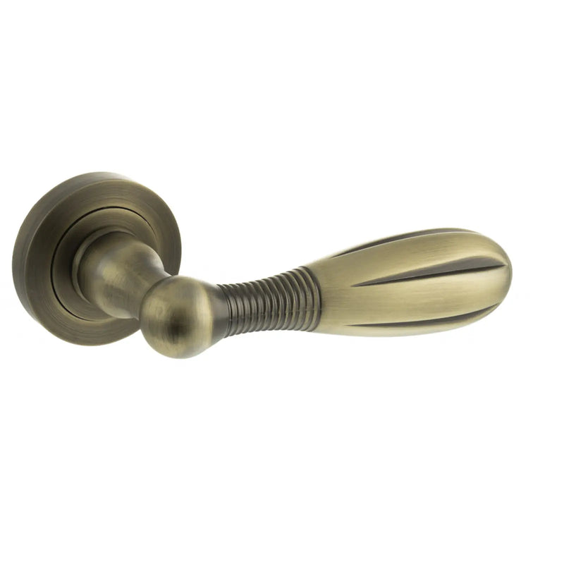 Atlantic Old English Cambridge Lever Door Handle on Round Rose - Matt Antique Brass