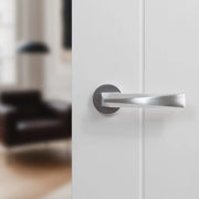 Atlantic Forme Crystal Lever Door Handle on Minimal Round Rose