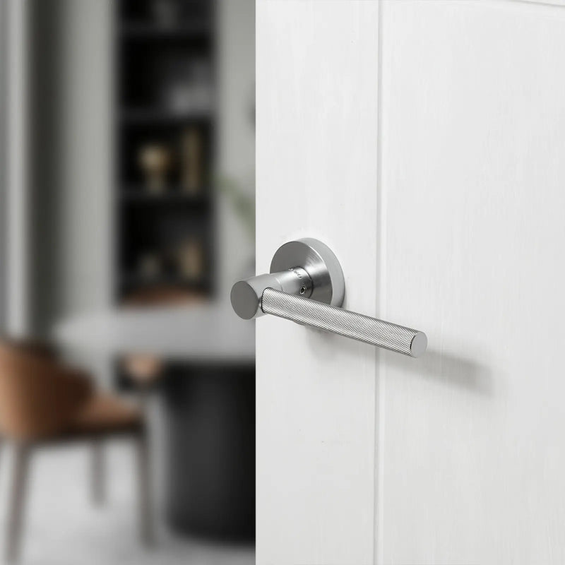 Atlantic Oro & Oro Stradi Lever Door Handle on Round Rose