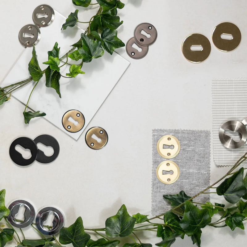 Atlantic Millhouse Brass Key Escutcheons on Round Rose