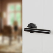 Atlantic Forme Elle Lever Door Handle on Minimal Round Rose