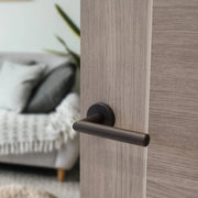 Atlantic Forme Elle Lever Door Handle on Minimal Round Rose