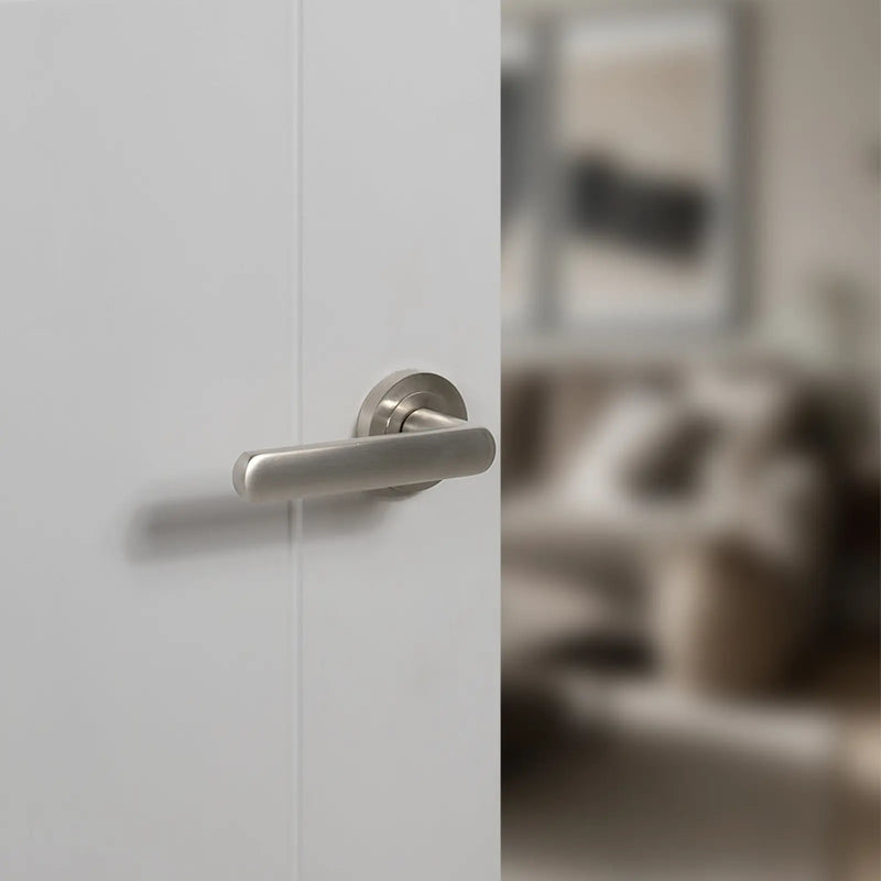 Atlantic STATUS Carolina Lever Door Handle on Round Rose