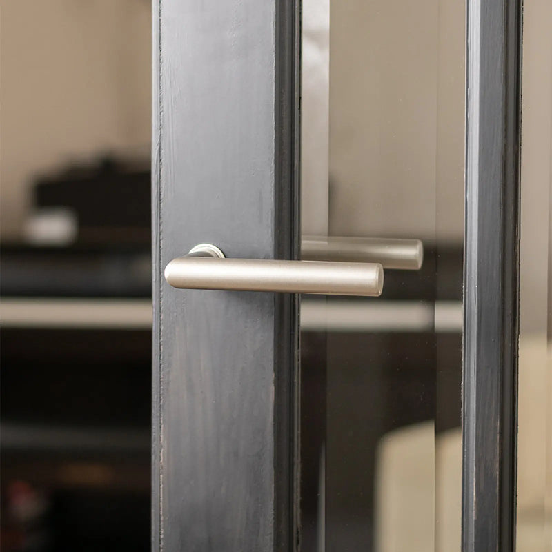 Atlantic Forme Elle Lever Door Handle on Concealed Round Rose