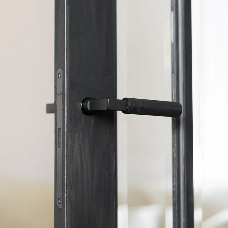 Atlantic Millhouse Brass Cartwright Lever Door Handle on Concealed Round Rose